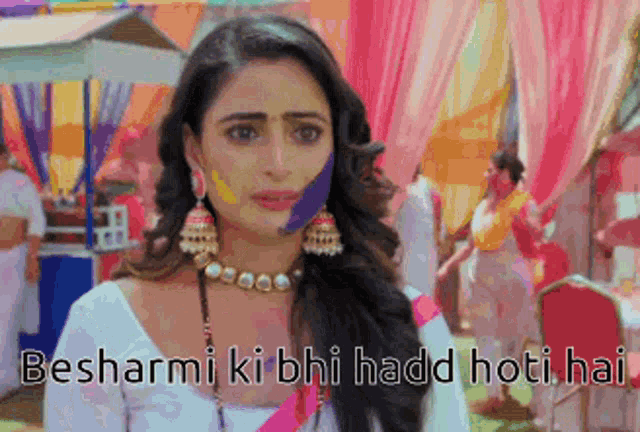 a woman with her face painted with the words besharmi ki bhi hadd hoti hai on the bottom