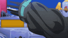a close up of a person 's arm with a blue strap around it