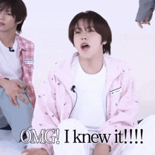 a boy in a pink jacket says omg i knew it !!!