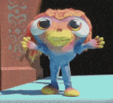 a colorful cartoon character with big eyes is standing on a table
