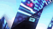 a close up of a computer screen with a reflection of a building in it .