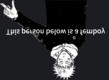 a black and white drawing of a man laying upside down with a foreign language written on it .