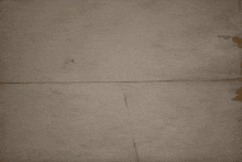 a piece of paper with a shadow of a hand on it