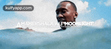 a man is swimming in the ocean with the words maharshala ali moonlight written on the bottom