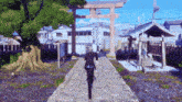 a man in a suit is walking down a path with a torii gate in the background