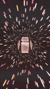 a pink background with a box that says ' natasha nadeem ' on it