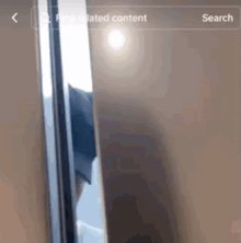 a screenshot of a phone screen that says search on the bottom right