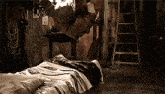 a person is laying on a bed in a dark room