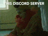 a clown with a red nose has the words this discord server above him