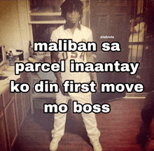a man standing in front of a sign that says maliban sa parcel inaantaly ko din first move mo boss