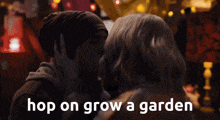a man and woman are kissing with the words hop on grow a garden above them