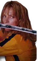 a woman with red hair is holding a sword in her mouth