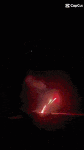 a fireworks display is displayed on a screen that says capcut