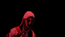 a person with blood on their face and a hood