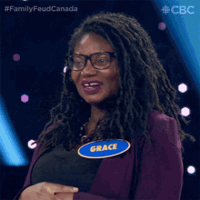 a woman with a name tag that says grace on it