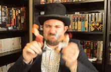 Playing With Toys Top Hat Gaming Man GIF - Playing With Toys Top Hat Gaming Man Toy GIFs