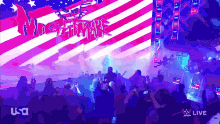 a crowd of people watching a wrestling show with the word nightmare written on the screen