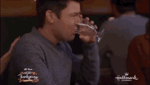 Tyler Hynes Drinking GIF - Tyler Hynes Drinking An Unexpected Christmas GIFs