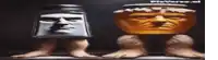 a salt and pepper shaker and a jar of honey with faces on them