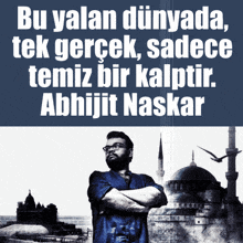 a man with his arms crossed stands in front of a mosque with a quote by abhijit naskar