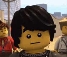 a close up of a lego figure with a serious face