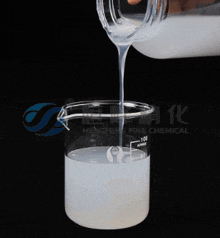 a liquid is being poured into a beaker that says hengfeng fine chemical on it