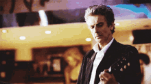 Doctor Who Peter Capaldi GIF - Doctor Who Peter Capaldi Playing Guitar GIFs