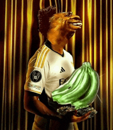 a soccer player with the number 15 on his jersey holding a banana