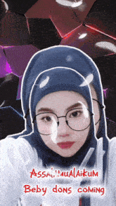 a woman wearing glasses and a hijab with the words assalamualaikum beby dons coming below her