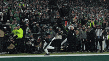 a football player wearing a jersey that says eagles on it