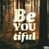 a poster that says be you tiful in front of a forest