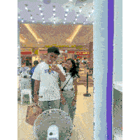 a man taking a picture of himself and a girl in front of a mirror