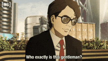 a man in a suit and red tie is asking who exactly is this gentleman