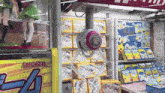 a crane in an arcade with a sign that says ' shonen ' on it