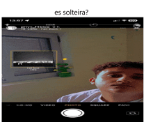 a phone screen shows a picture of a man and says es solteiro