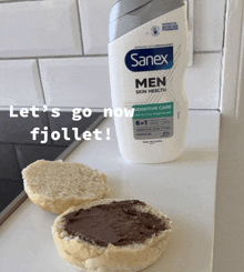 a bottle of sanex men skin health lotion next to a half eaten muffin