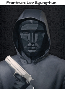 a poster for frontman lee byung-hun shows a man in a hoodie holding a gun