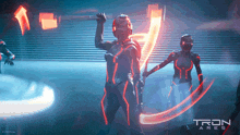 a poster for tron ares shows a woman holding a bat