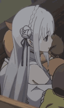 a girl with white hair and a flower in her hair is sitting in a chair