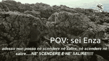 a black and white photo of a rocky cliff with the words pov sei enza written on it .