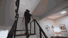 a woman is walking up a set of stairs in a house made in animatica