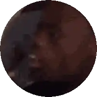 a pixelated image of a circle with a few dots on it
