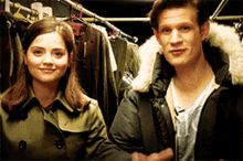 a man and a woman standing next to each other