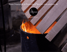 a picture of a fire with the words toute l' equipe de la tonnelerie mercier vous souhaite de below it