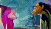 a couple of cartoon fish standing next to each other .