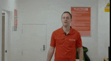 a man in a red playtech shirt says it 's much too late