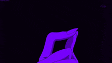 a person is holding a purple lightning bolt in their hand