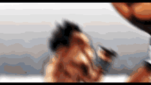 a blurred image of a person 's face with a gray background