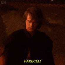 a man in a dark room with fakecel written in yellow