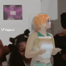 a woman with orange hair is dancing in front of a wall with a picture of jesus on it